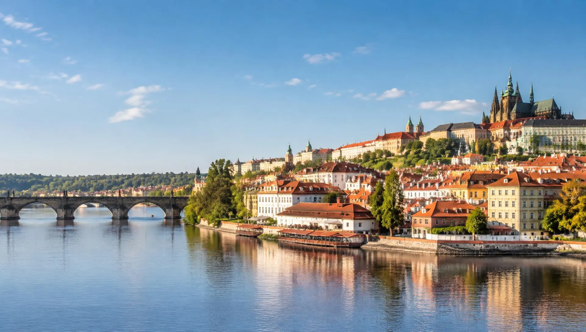 Prague Castle and the Vltava riverside in daylight, home of Exero Group